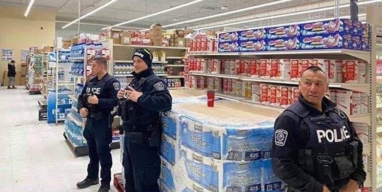 آیا عکس روحانی از توزیع دستمال کاغذی با پلیس آمریکا فتوشاپ بود؟